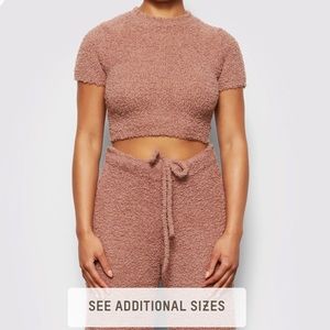 SKIMS Cozy Short Sleeve Crop Top and Lounge Pants Set in Mauve